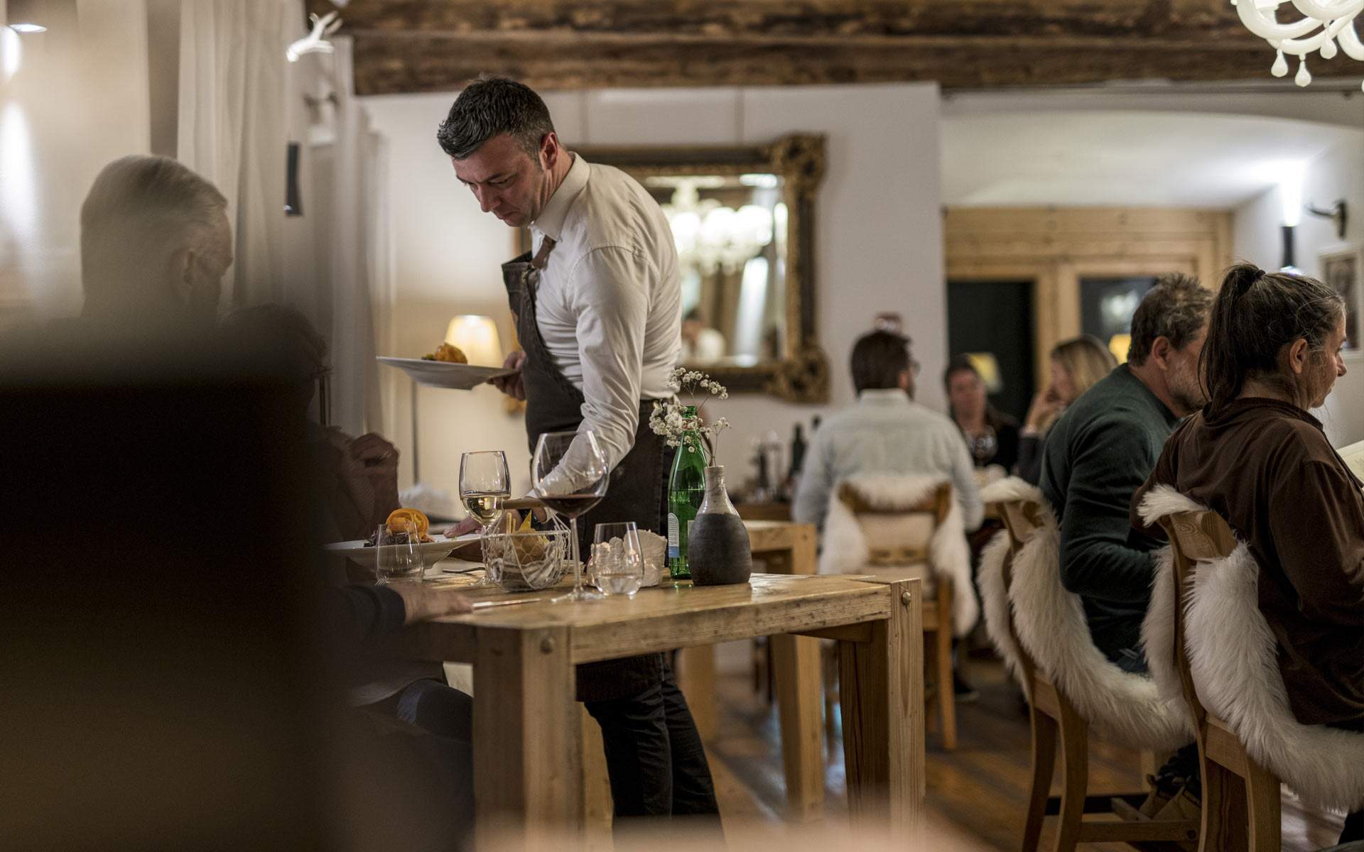 Waiter in the restaurant table service